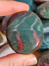 Load image into Gallery viewer, hand holding ocean jasper palm stone for meditation
