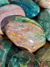 Load image into Gallery viewer, ocean jasper palm stone polished crystal with orb-like patterns
